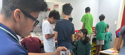 Students and coaches at the UP Robotics lab in downtown Bethesda