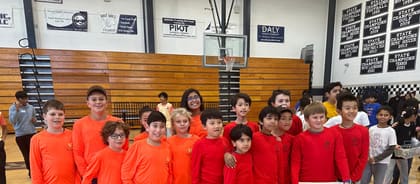 An UP Robotics competition team posing together at a tournament